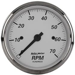 3-1/8" IN DASH TACHO, 7000RPM AMERICAN PLATINUM AUTO METER - 1995
