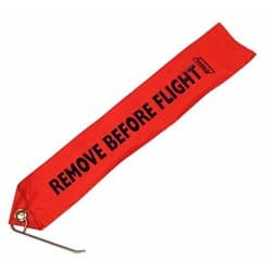 "REMOVE BEFORE FLIGHT" TAG WITH CHUTE LOCKING PIN. "RED" 475